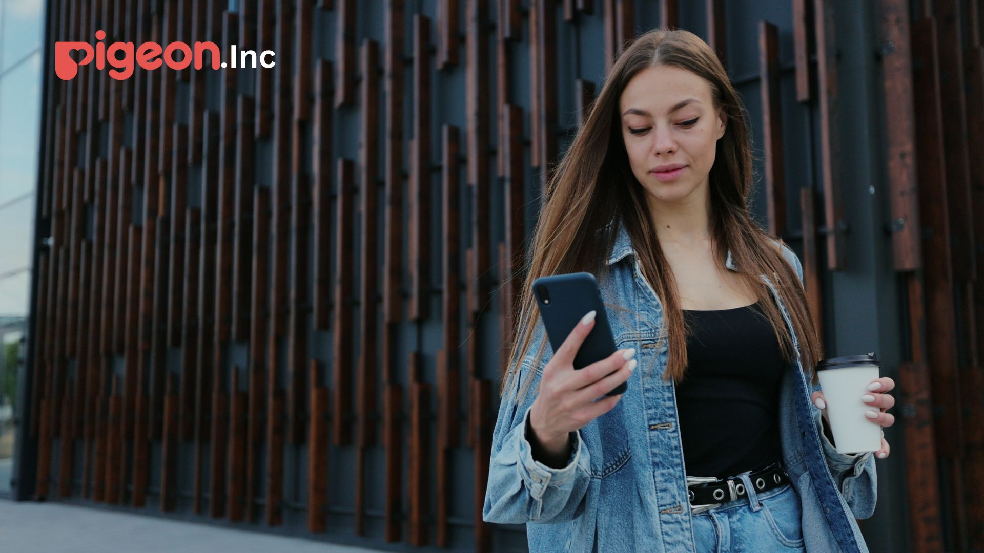 A woman cleaning a kitchen counter with yellow gloves